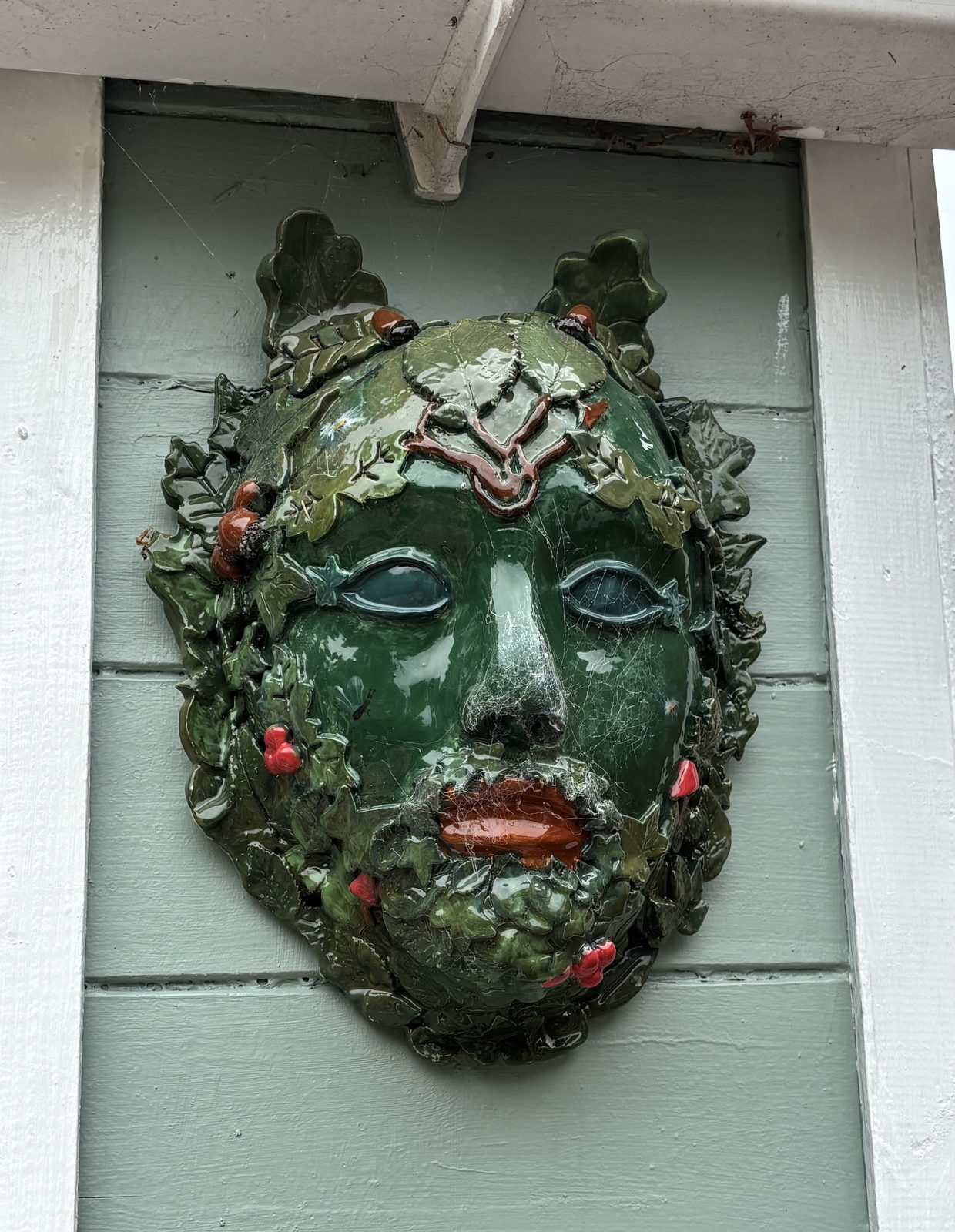 Green man face wall plaque
