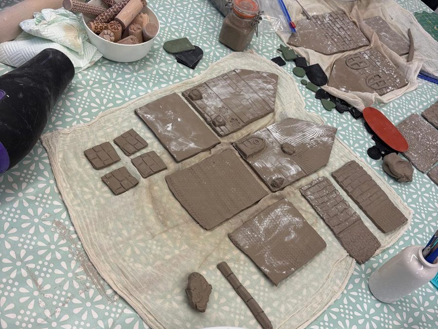 Rolled and textured clay slabs cut ready to build a house